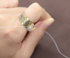 Dụng cụ cắt chỉ Clover Thread Cutter Ring Art 57535